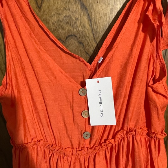 So chic boutique adjustable ties strapped dress. New with tags. Sz small. - Picture 2 of 2